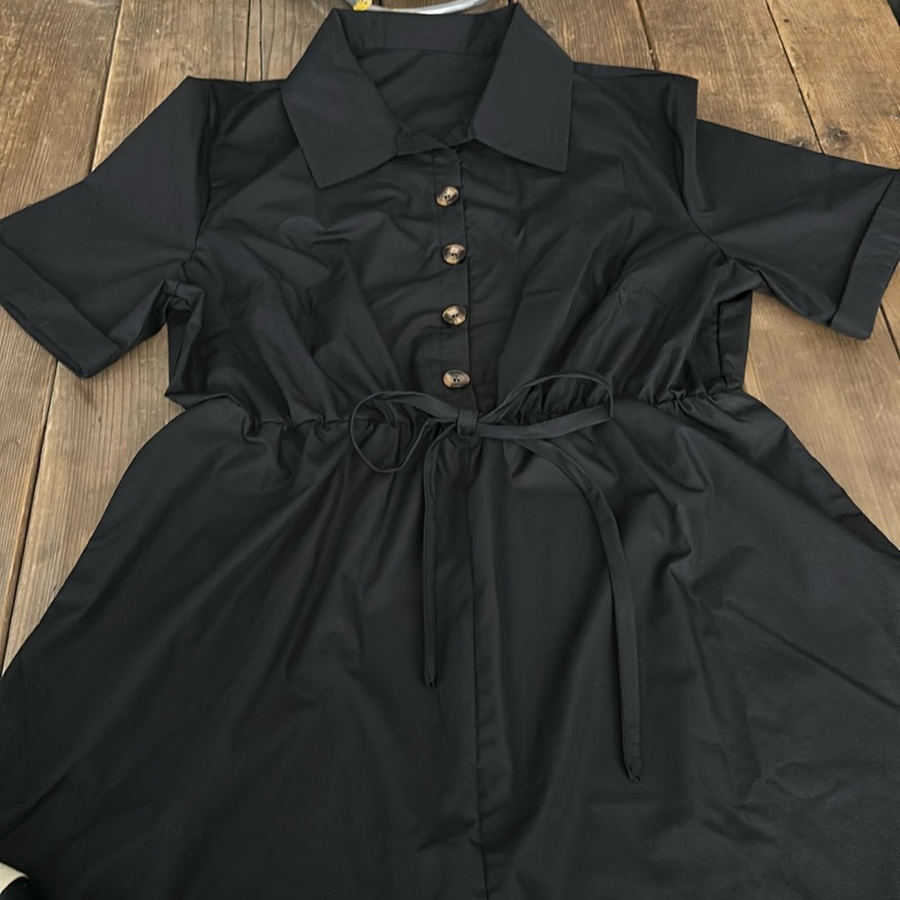 NWOT XL black shorts jumpsuit with pockets, elastic waist, faux tie at waist